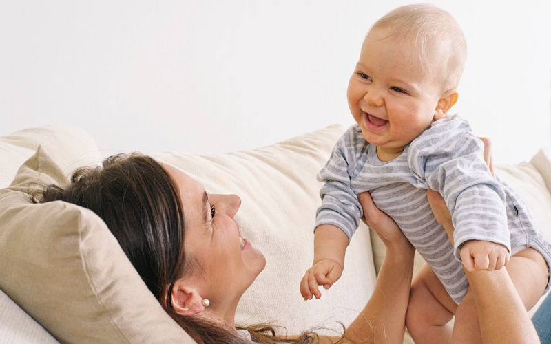 happy mom and baby