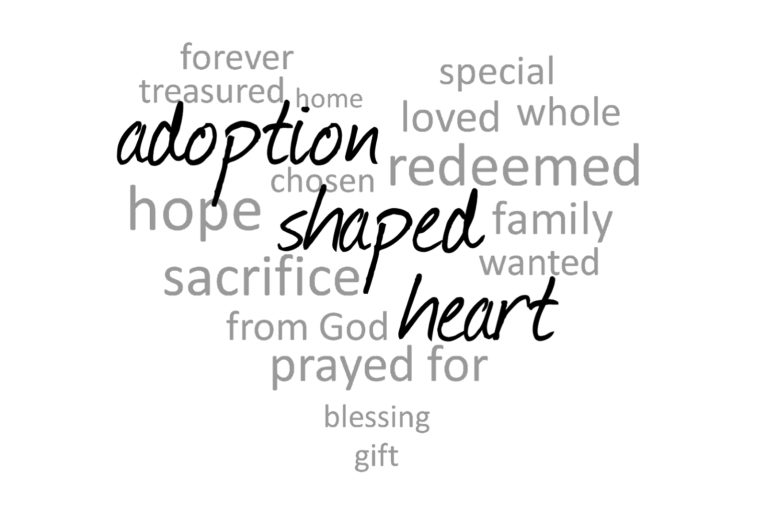 Adoption shaped heart filled with words